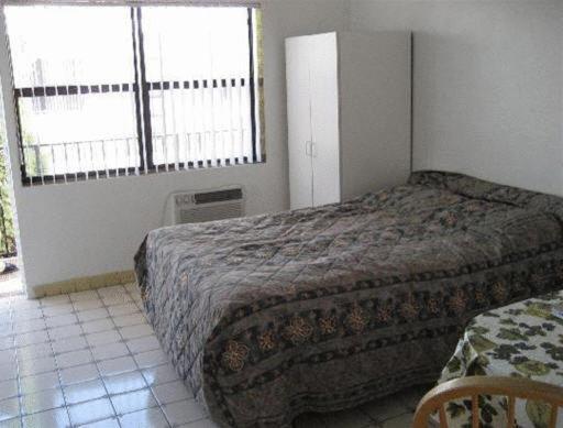 Postel nebo postele na pokoji v ubytování Napoli Belmar Resort