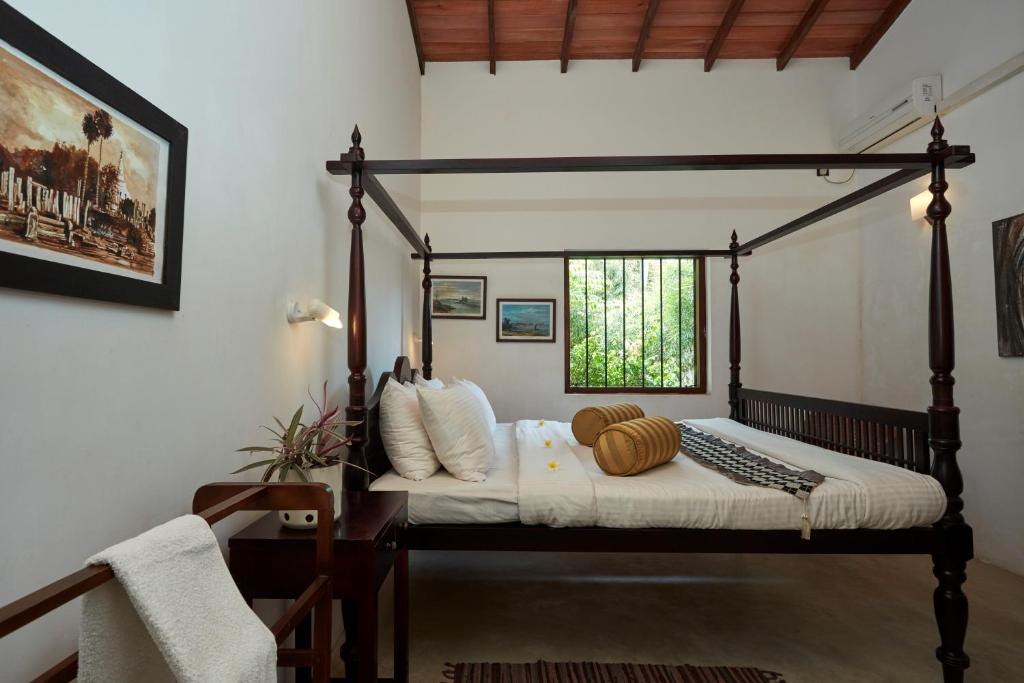 Postel nebo postele na pokoji v ubytování Villa Sunbird Negombo