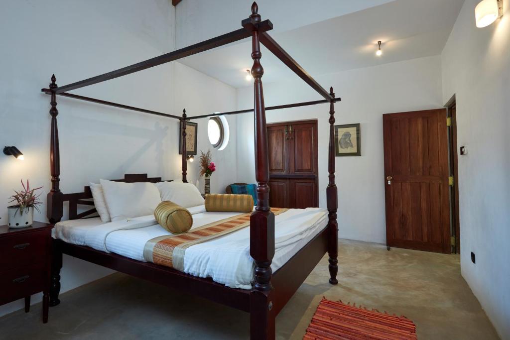 Postel nebo postele na pokoji v ubytování Villa Sunbird Negombo