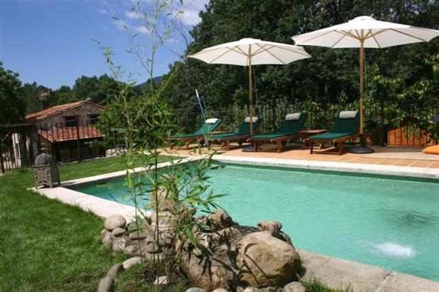 The swimming pool at or close to Hotel Rural El Marquesito Antigua Casa Carmela