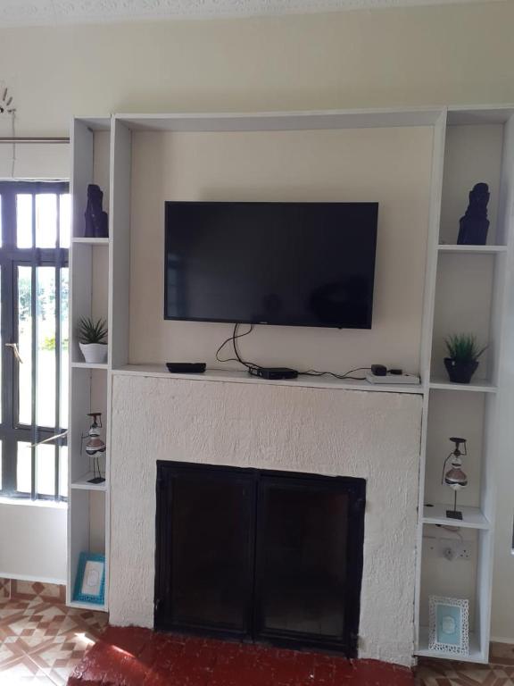 TV a/nebo společenská místnost v ubytování Madison guest house