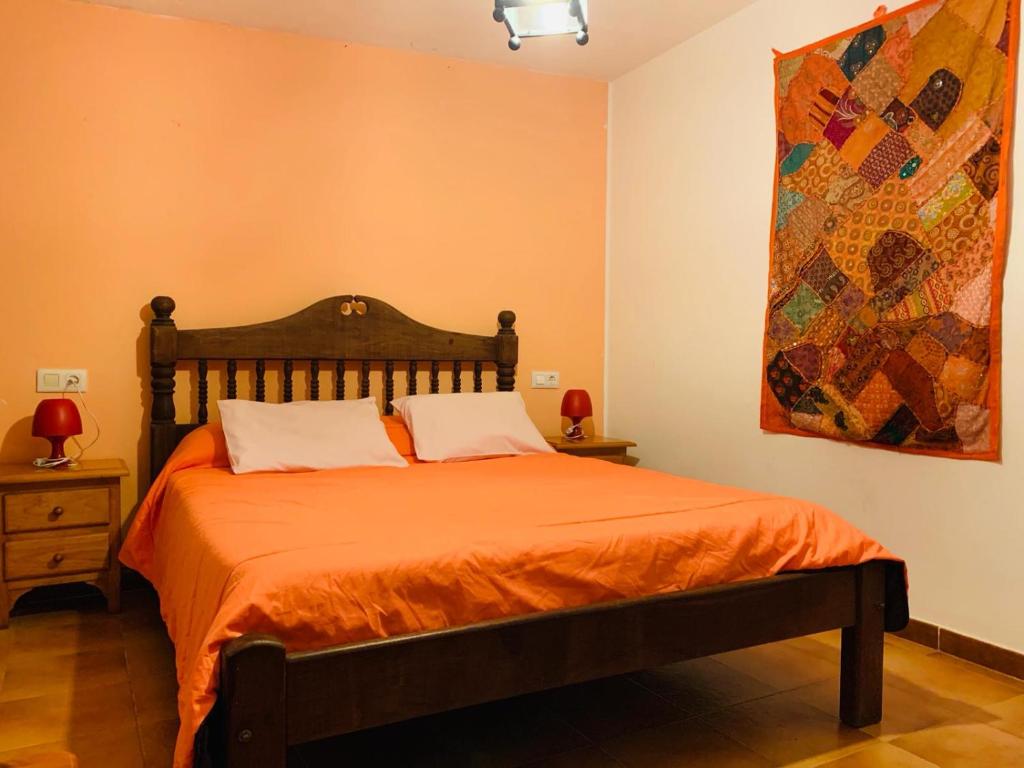 Postel nebo postele na pokoji v ubytování Barranco de la Salud