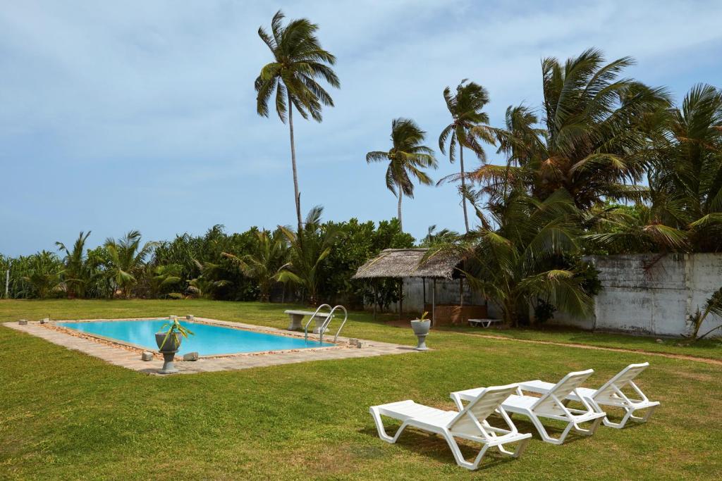 Bazén v ubytování Villa Sunbird Negombo nebo v jeho okolí