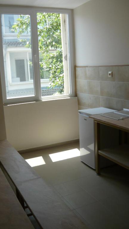 A bed or beds in a room at Hostel Penev