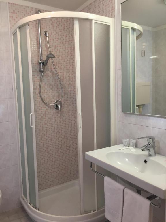 Koupelna v ubytování Hotel Storione