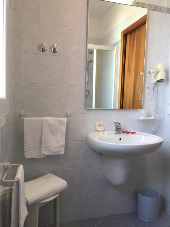 Koupelna v ubytování Hotel Storione