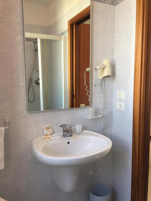 Koupelna v ubytování Hotel Storione