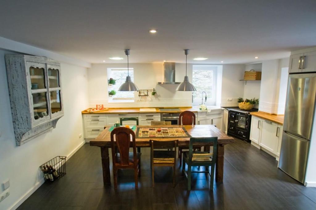 A kitchen or kitchenette at La Postoca