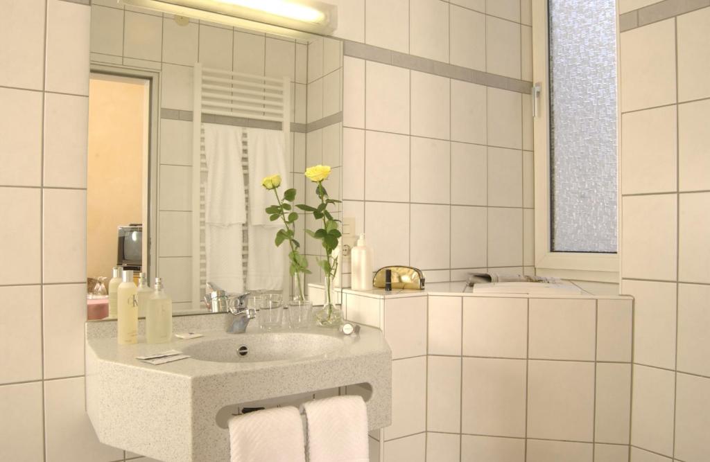 Koupelna v ubytování City Partner Hotel Strauss