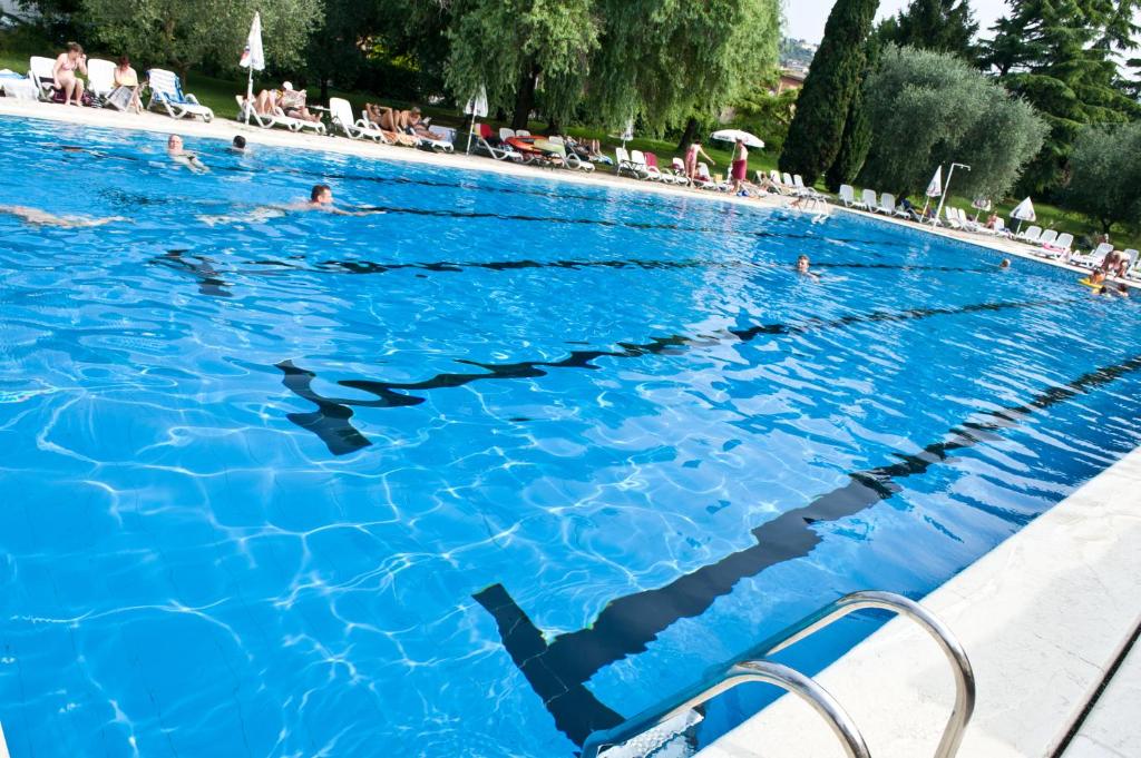 Bazén v ubytování Hotel Palme & Suite nebo v jeho okolí