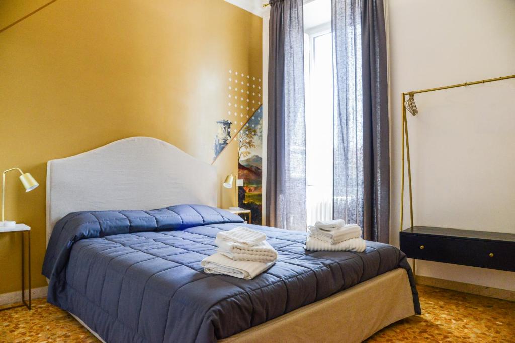Posteľ alebo postele v izbe v ubytovaní San Pietro Suite Rome