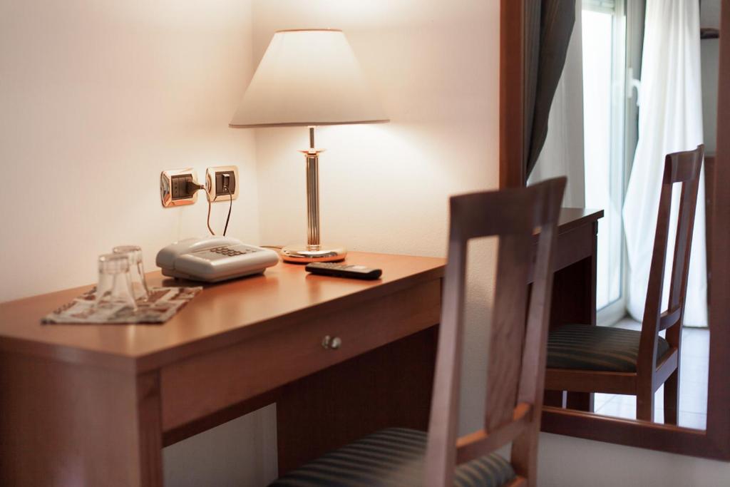 Postel nebo postele na pokoji v ubytování Hotel Everest