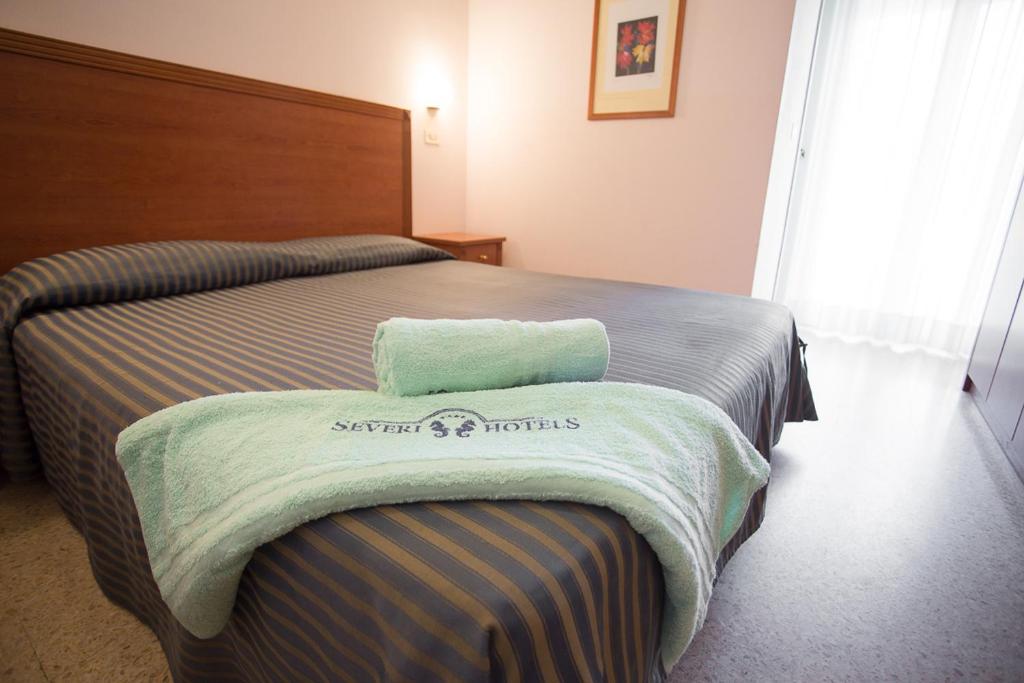Postel nebo postele na pokoji v ubytování Hotel Everest
