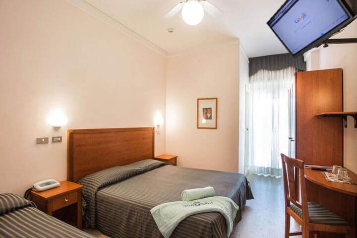 Postel nebo postele na pokoji v ubytování Hotel Everest