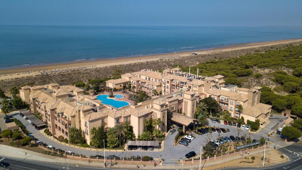 an aerial view of a building next to the beach at Barceló Punta Umbría Mar in Punta Umbría
