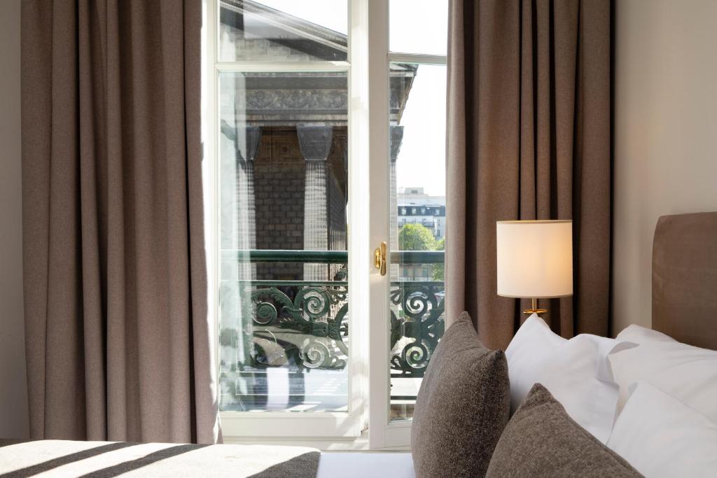 Hôtel Madeleine Plaza - Resim 10