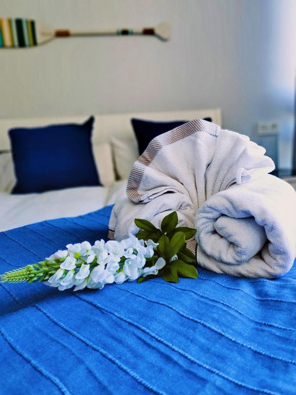 Postel nebo postele na pokoji v ubytování La Perla Apartment BY NAMASTE ELITE