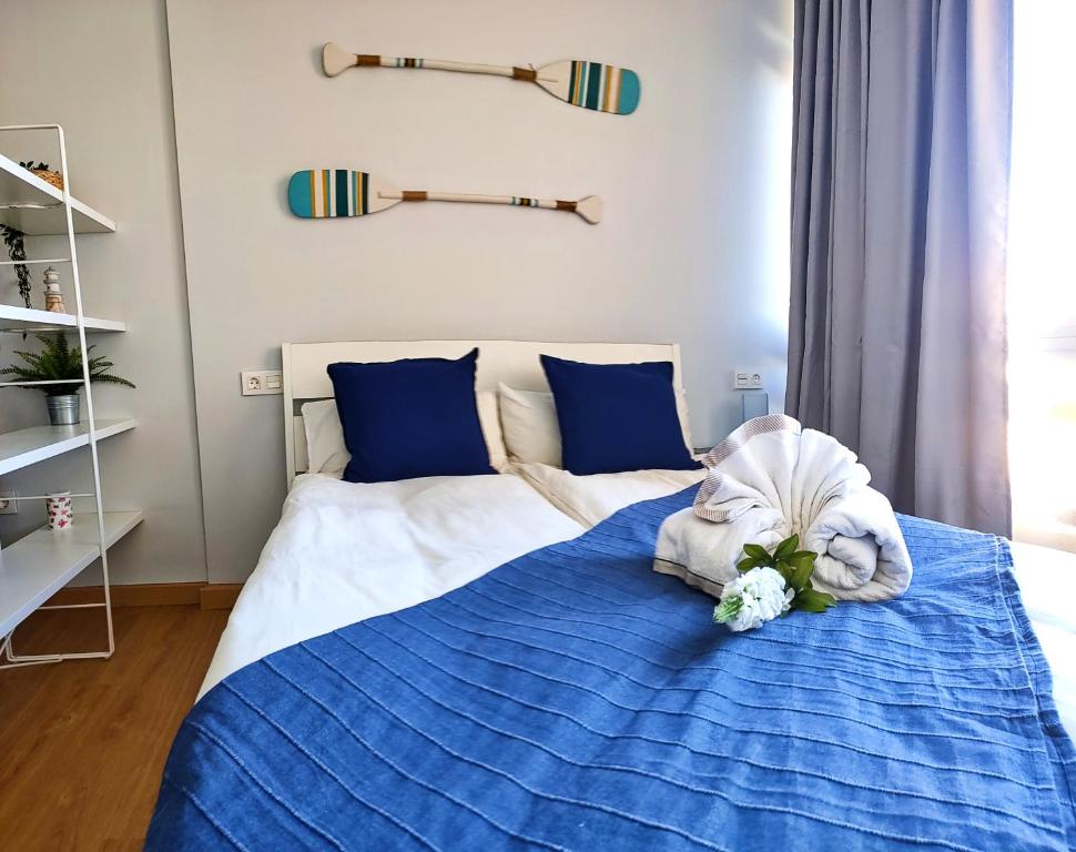 Postel nebo postele na pokoji v ubytování La Perla Apartment BY NAMASTE ELITE