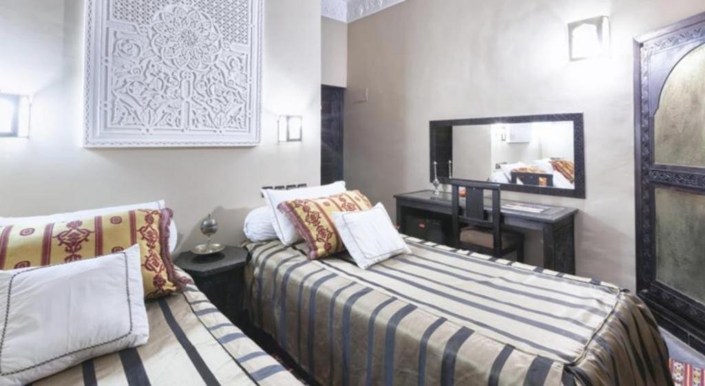 Postel nebo postele na pokoji v ubytování Hotel Azoul