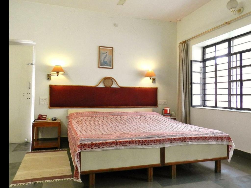 Postel nebo postele na pokoji v ubytování Jaipur Jantar Hostel