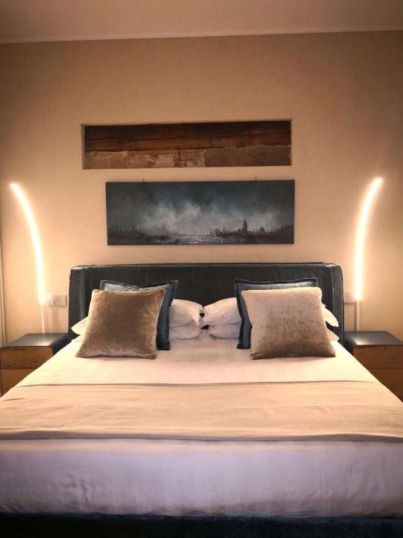Postel nebo postele na pokoji v ubytování Cinqueteste Luxury Home