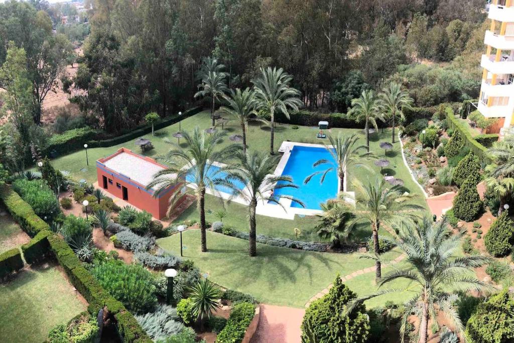 Bazén v ubytování Penthouse /View/Sea/Quiet/Golf/Pool/Atalaya nebo v jeho okolí
