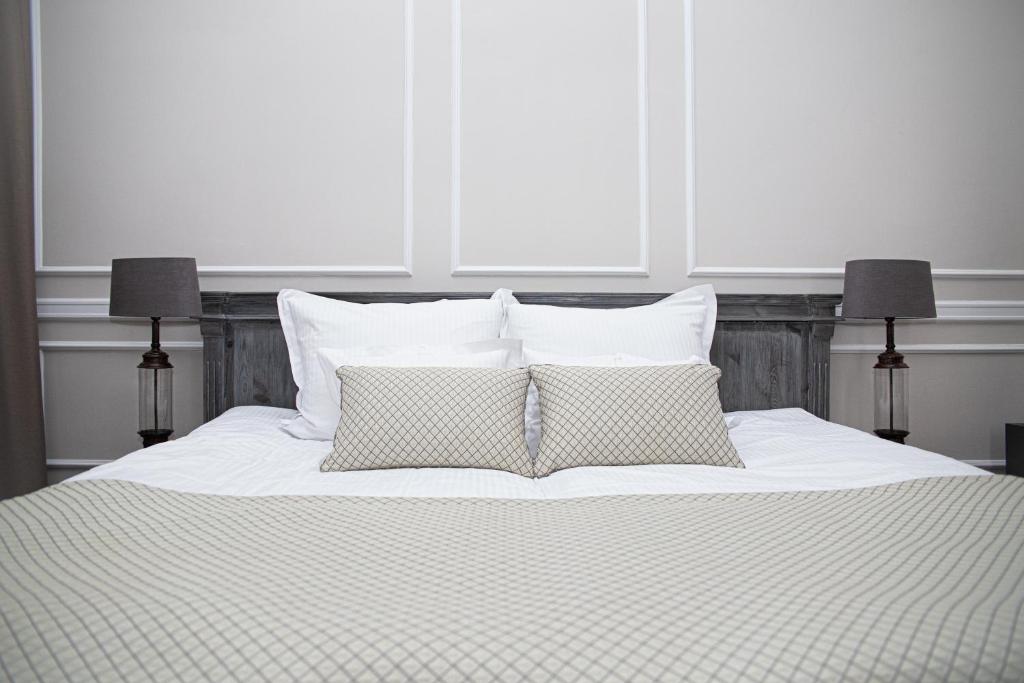 Postel nebo postele na pokoji v ubytování Hotel Wodnik