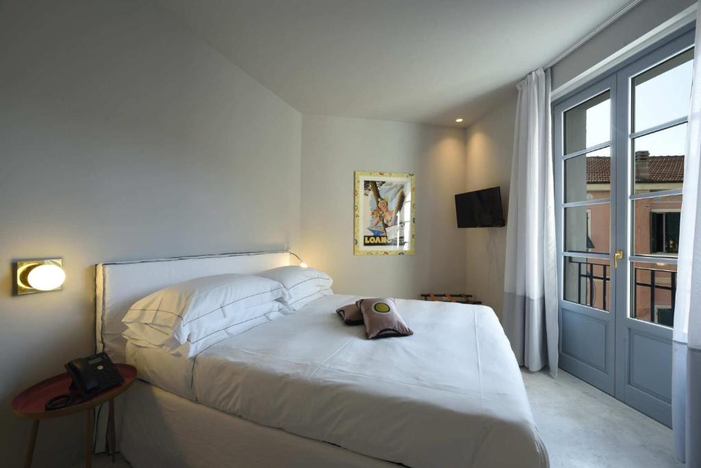 Boutique Hotel de la Villeにあるベッド