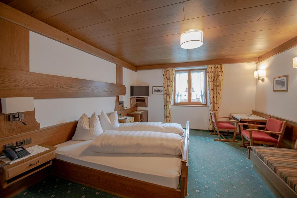 Postel nebo postele na pokoji v ubytování Haus Gamberg