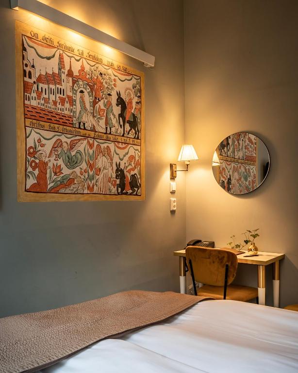 Postel nebo postele na pokoji v ubytování Lady Hamilton Hotel