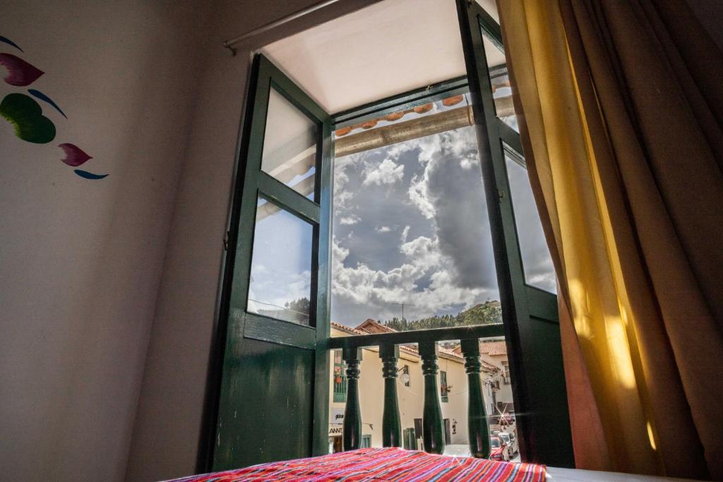 Postel nebo postele na pokoji v ubytování Hotel Cusco Plaza Saphi
