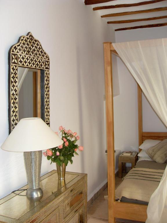 Postel nebo postele na pokoji v ubytování Riad Timila