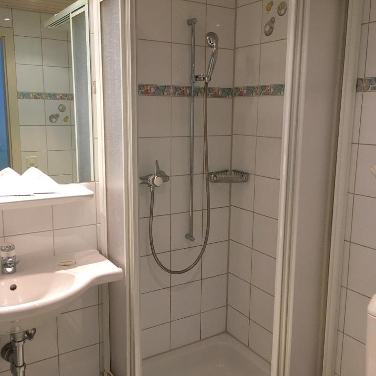 Koupelna v ubytování Hotel Châlet Du Lac
