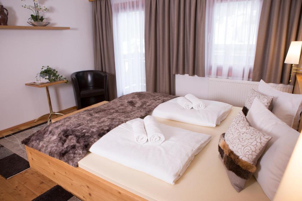 Postel nebo postele na pokoji v ubytování Ferienhaus Pöttler