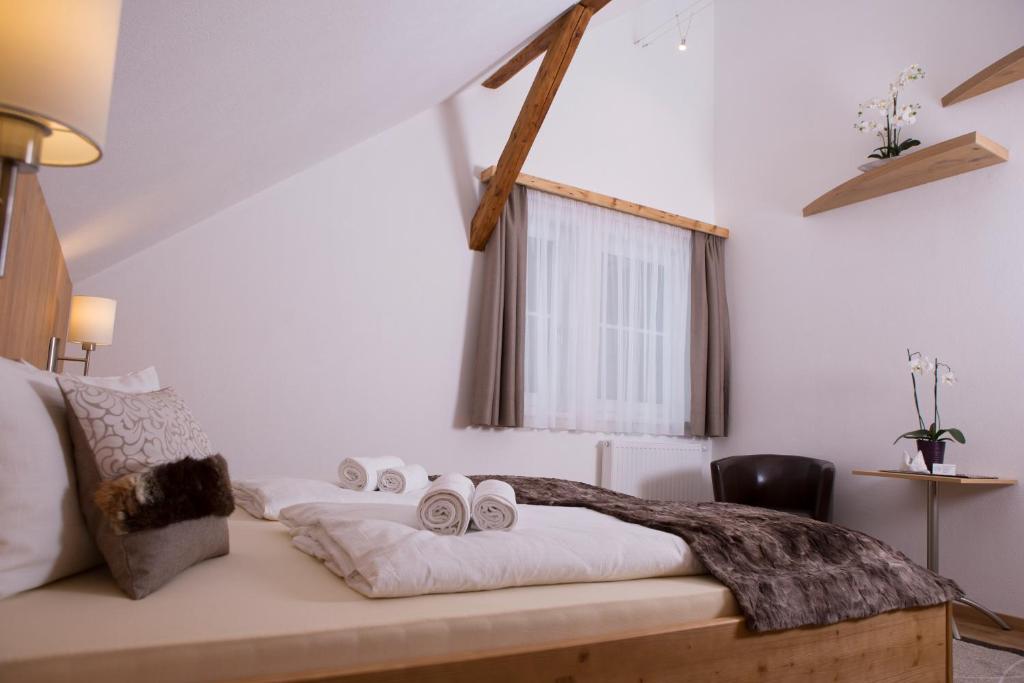 Postel nebo postele na pokoji v ubytování Ferienhaus Pöttler