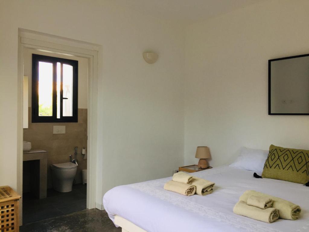 Postel nebo postele na pokoji v ubytování MAYANA SICILY - The suites