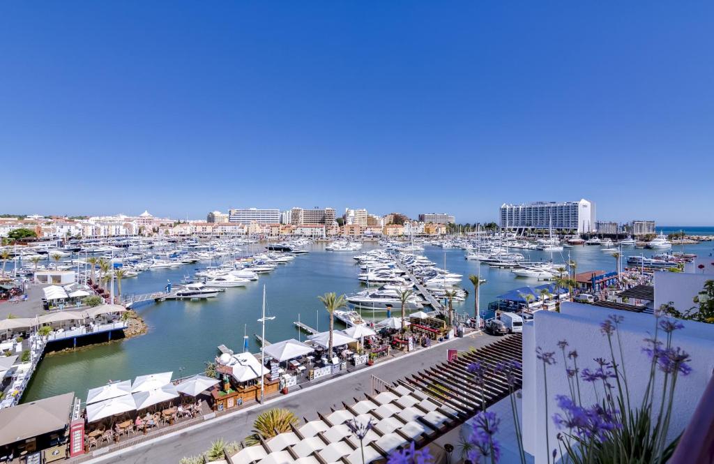 a view of a marina with boats in the water at Vila Marina - Luxurious apartment - Sea view in Vilamoura