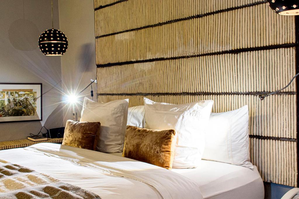 מיטה או מיטות בחדר ב-Boutique Hotel Particulier