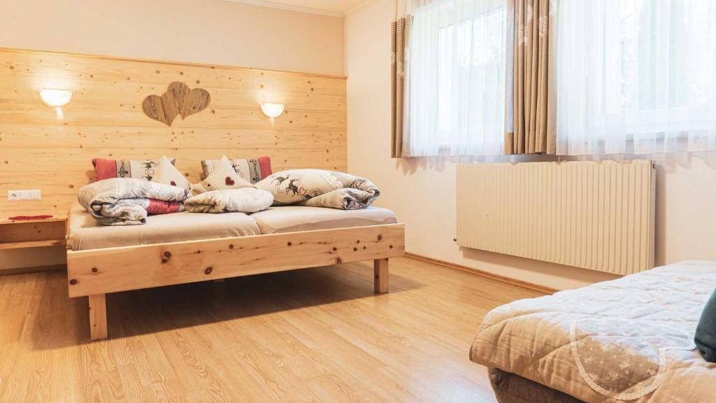 Postel nebo postele na pokoji v ubytování Haus Alpenchalet