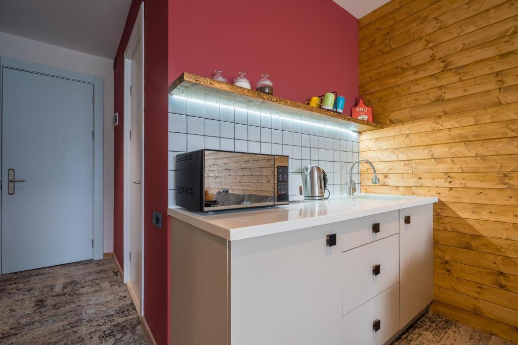 Kuchyň nebo kuchyňský kout v ubytování New Gudauri, Atrium 228