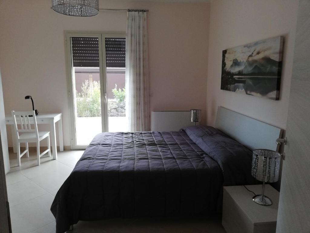 Posteľ alebo postele v izbe v ubytovaní L'elicriso B&B