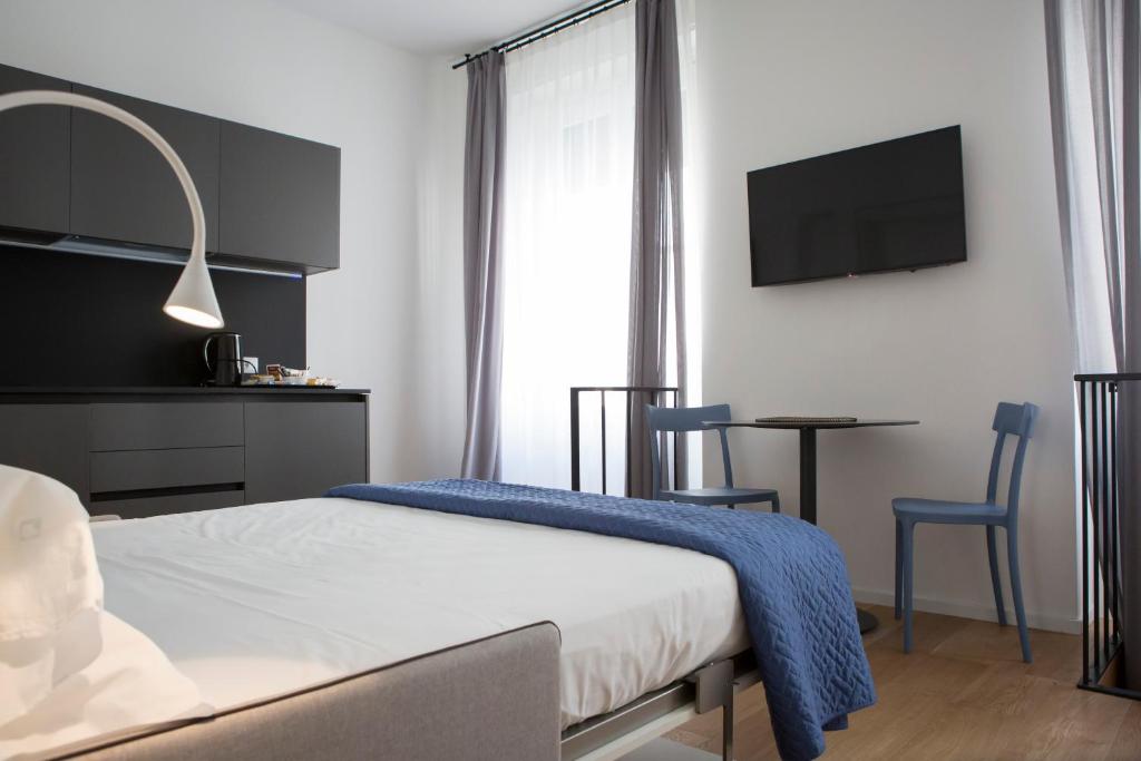 Postel nebo postele na pokoji v ubytování Trieste 411 - Rooms & Apartments