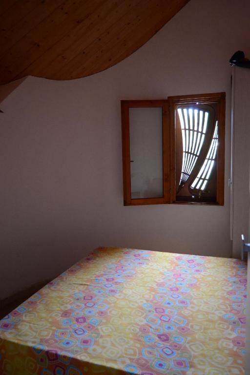Łóżko lub łóżka w pokoju w obiekcie Relax