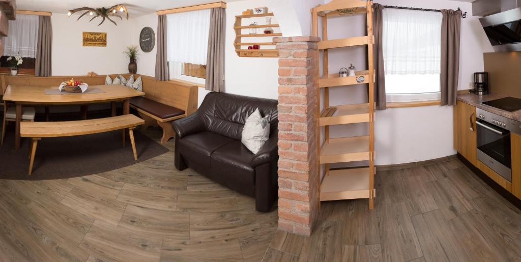 Posezení v ubytování Ferienhaus Pöttler