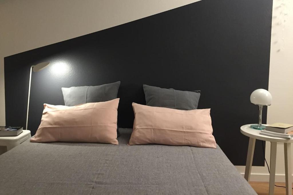 Posteľ alebo postele v izbe v ubytovaní Buonconsiglio apartment
