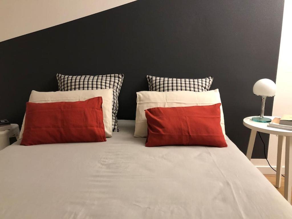 Posteľ alebo postele v izbe v ubytovaní Buonconsiglio apartment