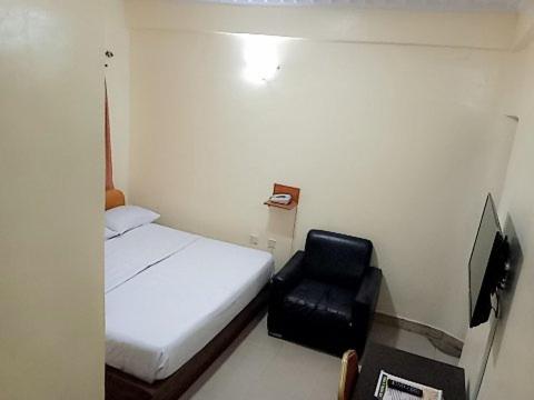 TV a/nebo společenská místnost v ubytování JCB Hotel