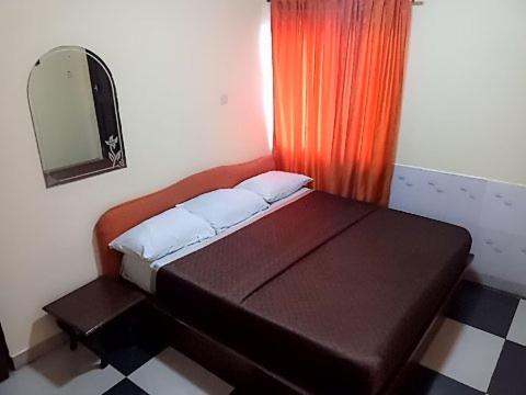 Postel nebo postele na pokoji v ubytování JCB Hotel