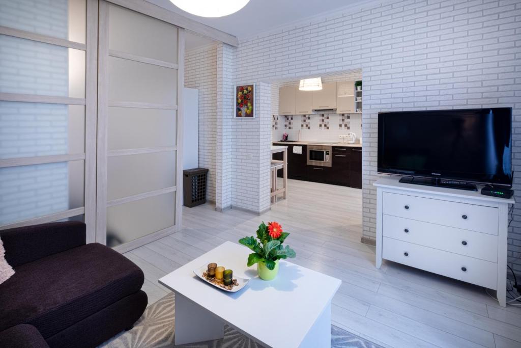 Телевизор и/или развлекательный центр в Riga Centre Apartment