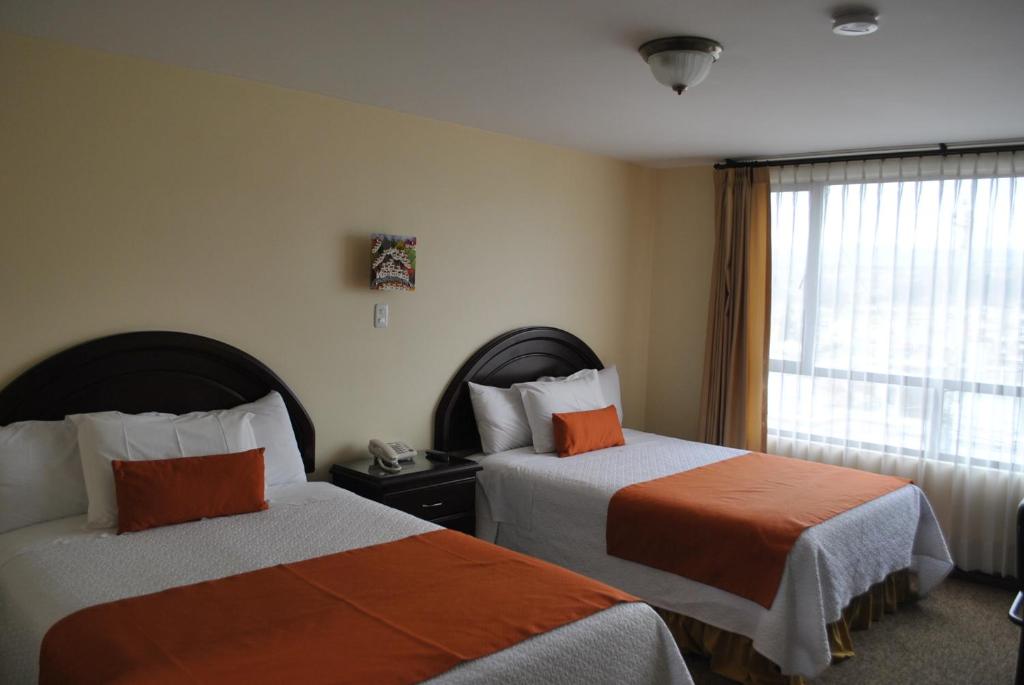 Postel nebo postele na pokoji v ubytování MAK INN HOUSE